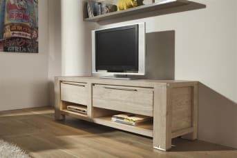 Au quotidien, ce meuble TV Buckley saura vous apporter entière satisfaction. Diposant d'un tiroir, de 2 niches et d'une porte rabattante, ce <a href="/hh/meubles-de-rangement/meubles-tv/">meuble TV</a> avec rangement de 150 cm est également doté de LED pour vous offrir une meilleure visibilité. Pratique et tendance, ce meuble TV est idéal pour placer votre écran à la bonne hauteur. Téléchargez notre catalogue !