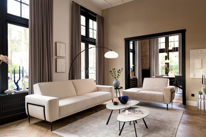 De PLUGIA bank past goed in een vintage & modern interieur